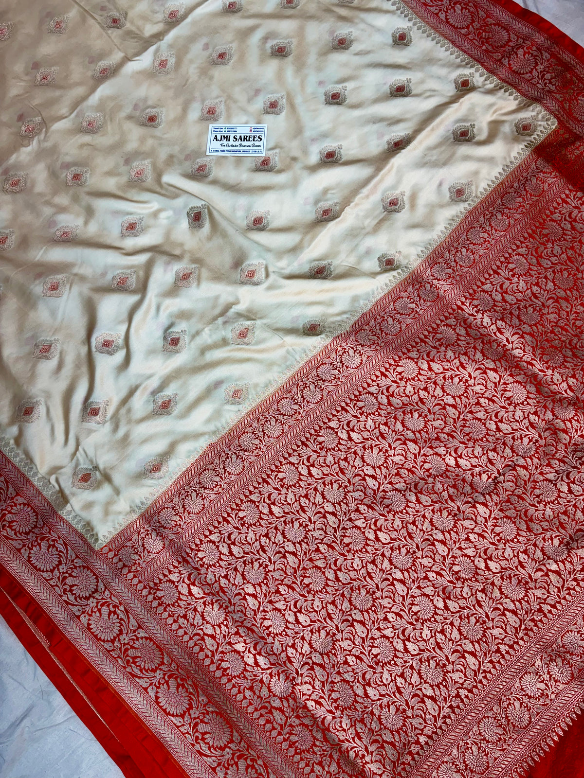 Luxury Premium Ivory Mashru Katan Silk Banarasi Saree with Contrast Orange Border & Meenakari Motifs Banarasi Saree