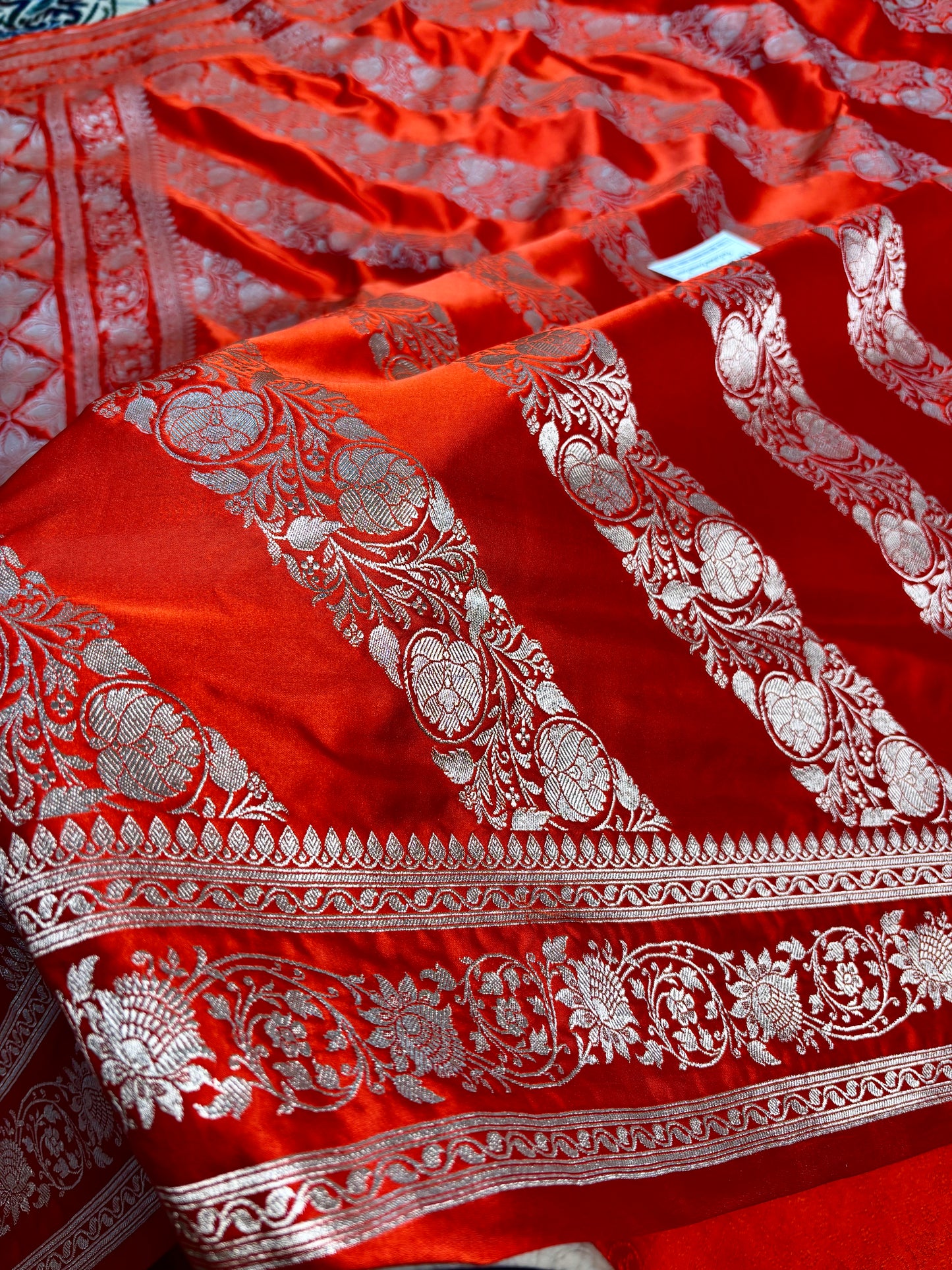 traditional orange banarasi silk saree zari motifs