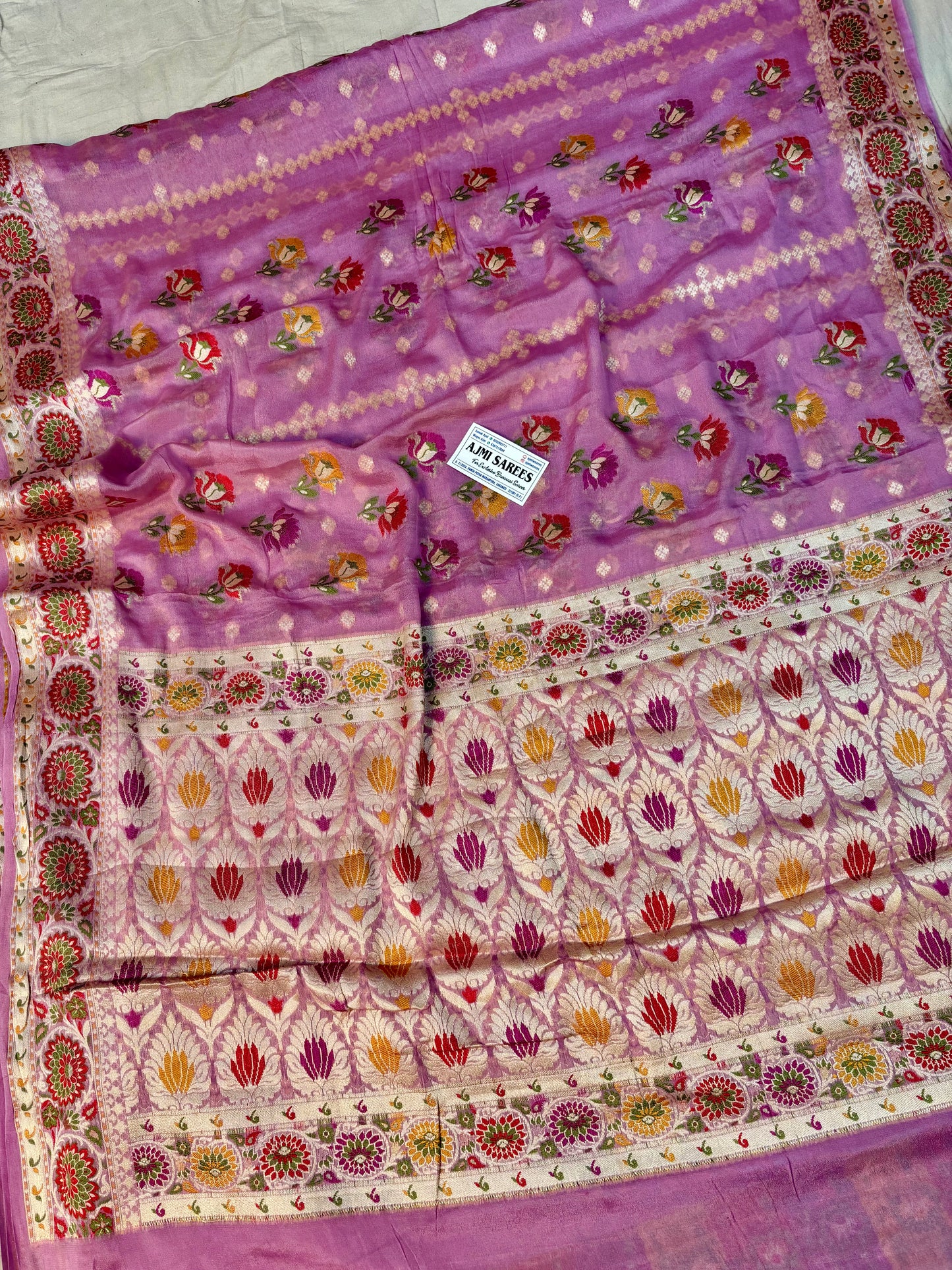 Rani pink Banarasi saree with water zari border