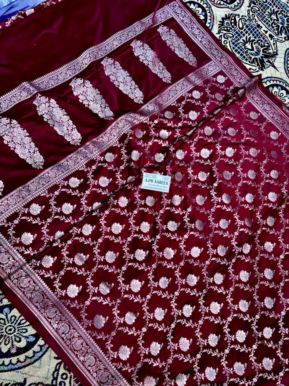 traditional maroon banarasi saree with zari border design