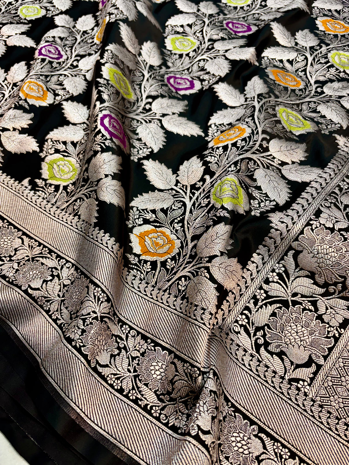 Premium black Mashru Katan silk Banarasi saree with silver zari and multicolour Meenakari floral jaal