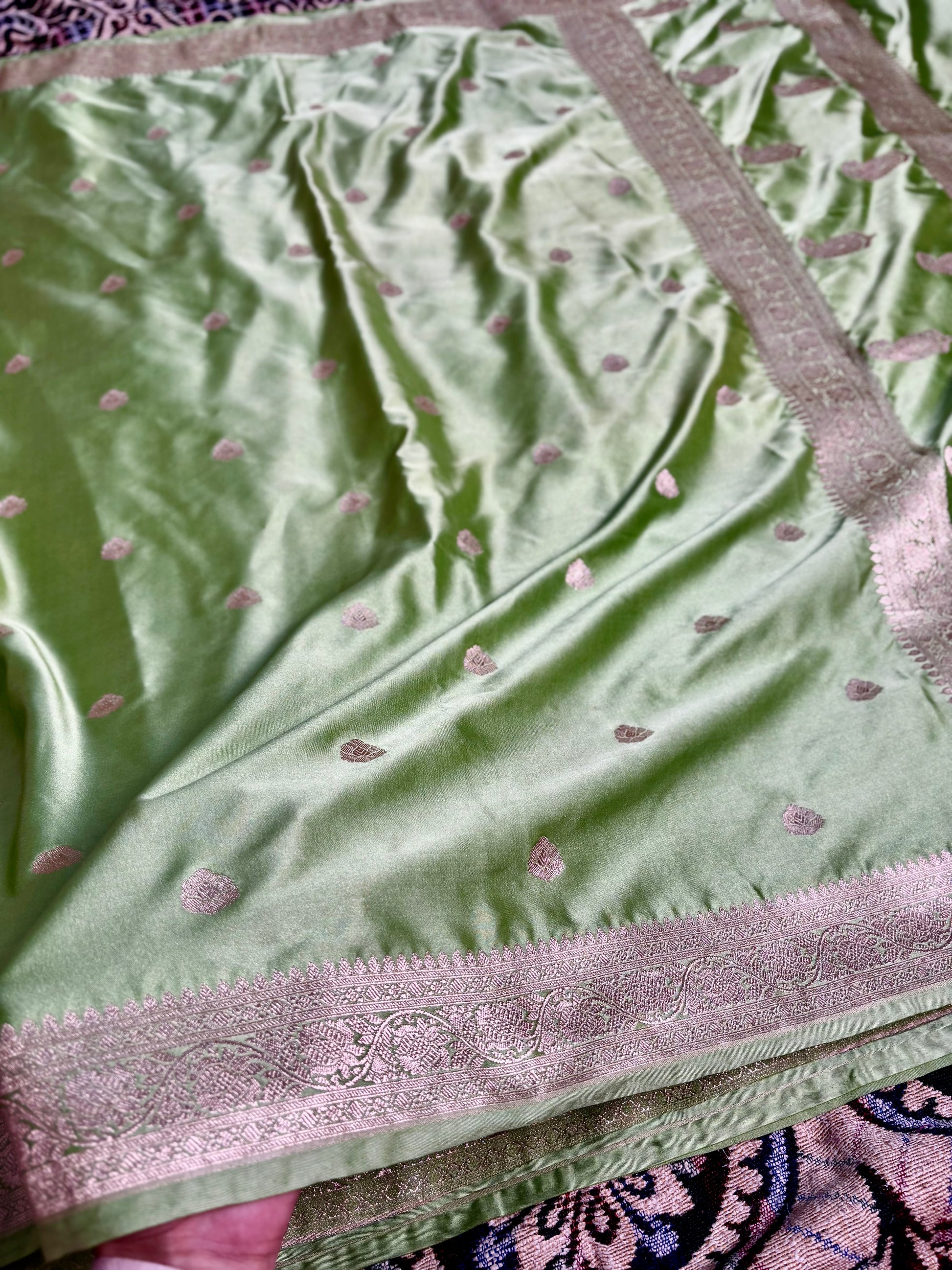 Traditional pista green banarasi saree with zari woven border