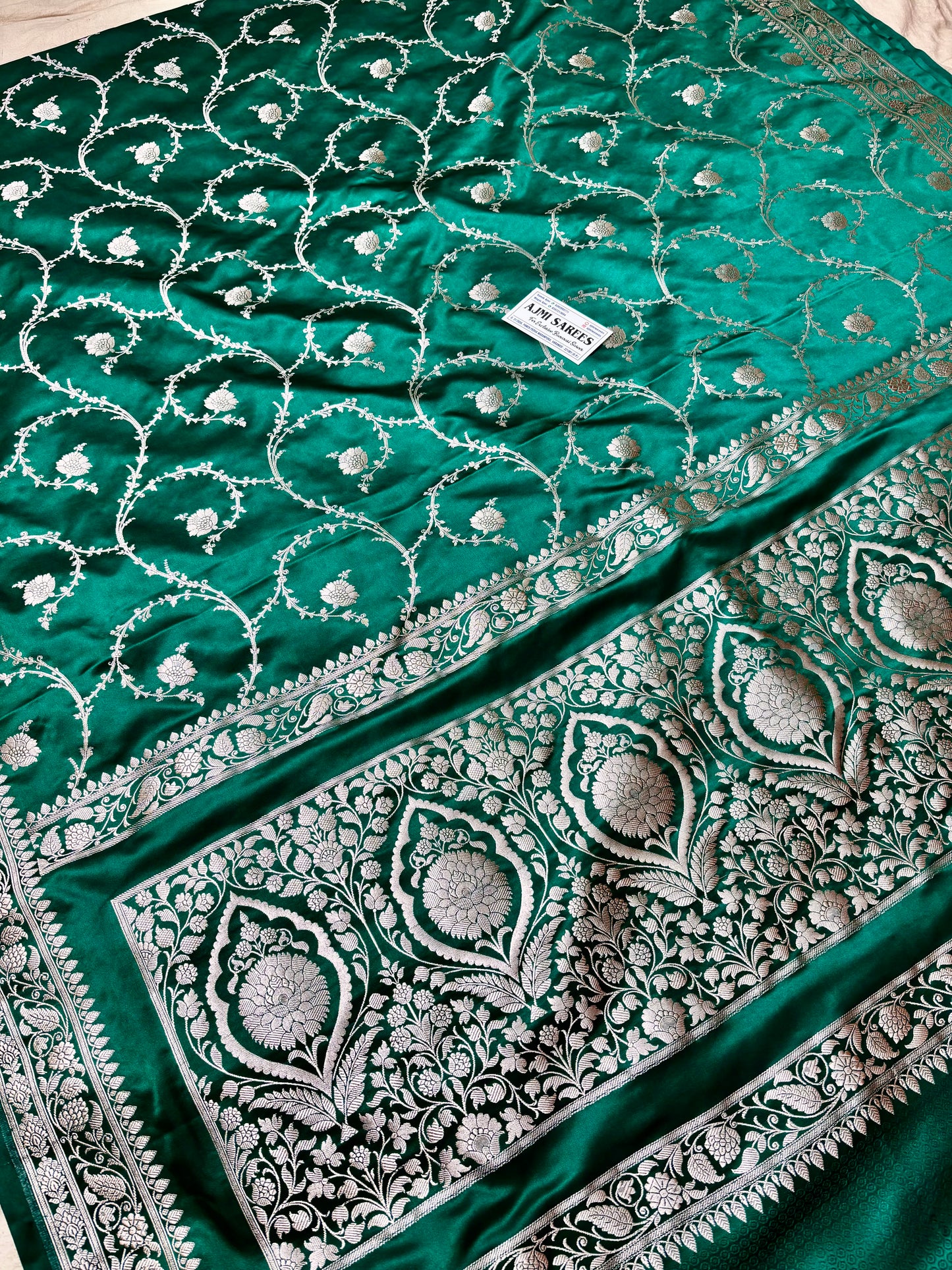 Rama green silk saree with intricate Banarasi zari work
