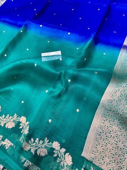 Pure Kora Silk Handloom Banarasi Saree – Royal Blue × Rama Green Dual Shade | All-Over Kadwa Motifs Banarasi Saree