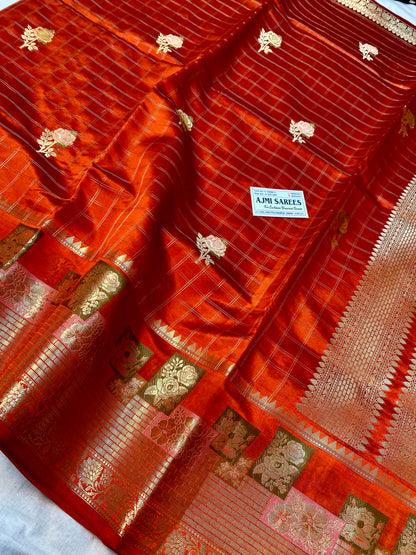 Pure silk Banarasi saree featuring Tilfi border and floral butas