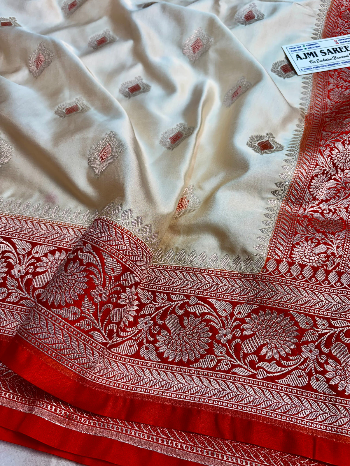 Luxury Premium Ivory Mashru Katan Silk Banarasi Saree with Contrast Orange Border & Meenakari Motifs Banarasi Saree