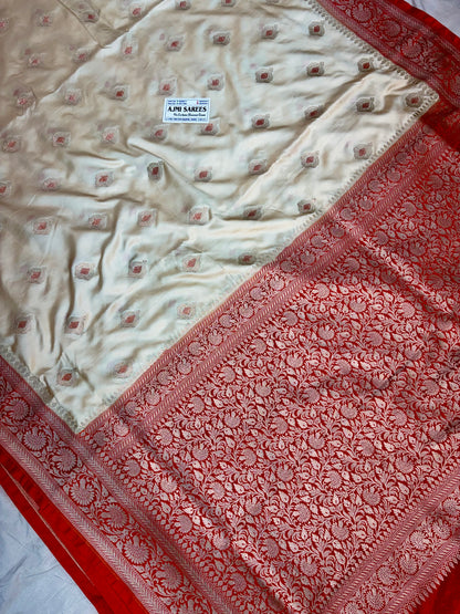 Luxury Premium Ivory Mashru Katan Silk Banarasi Saree with Contrast Orange Border & Meenakari Motifs Banarasi Saree