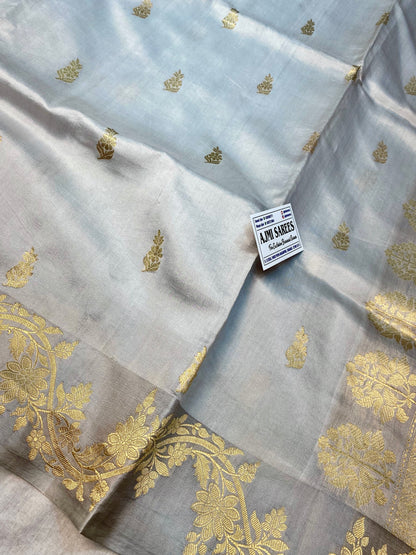 Light grey Banarasi saree with all-over Kadwa motifs and satin border