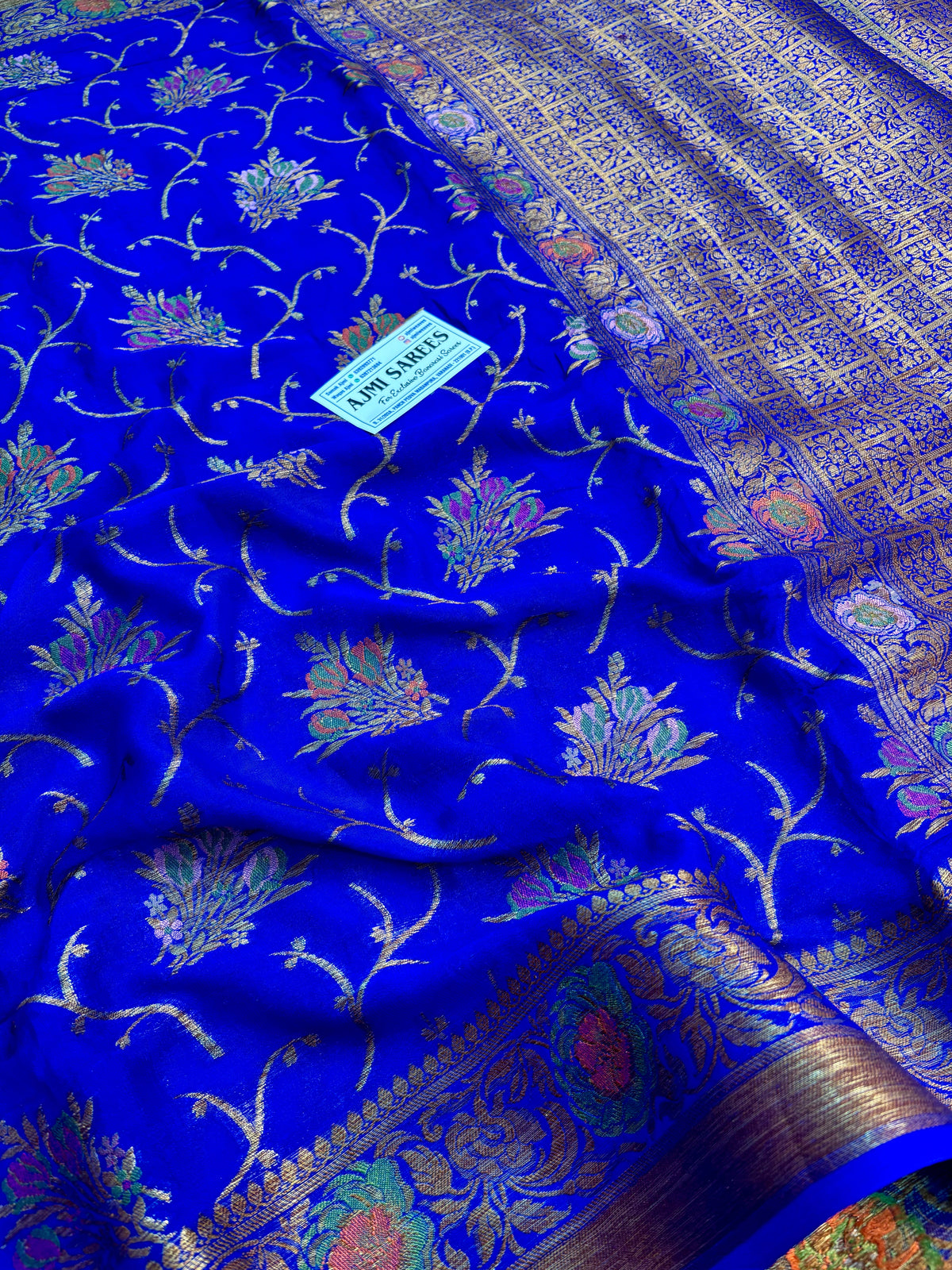 Royal blue Banarasi Tilfi saree with antique copper zari floral border