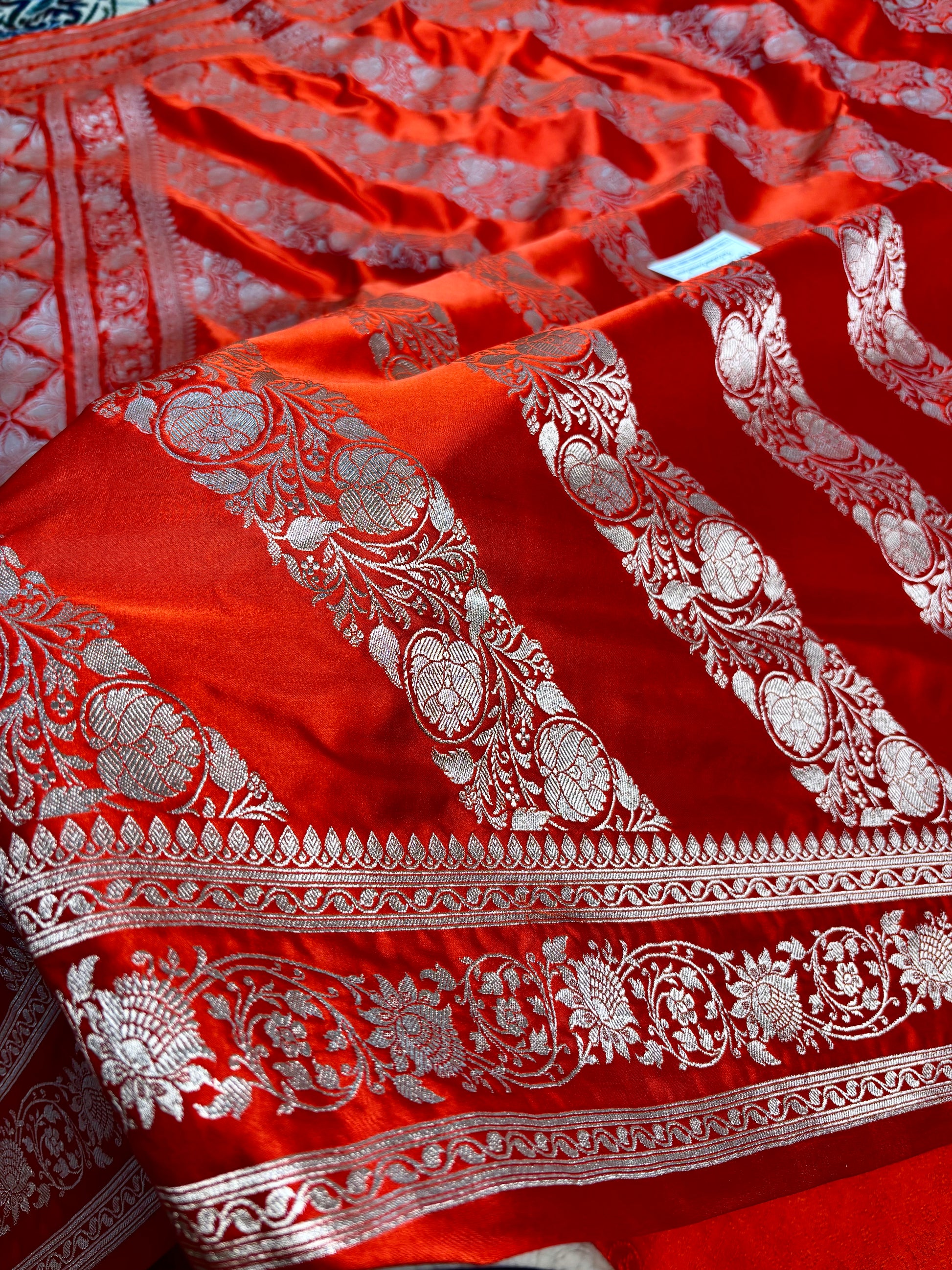 traditional orange banarasi silk saree zari motifs