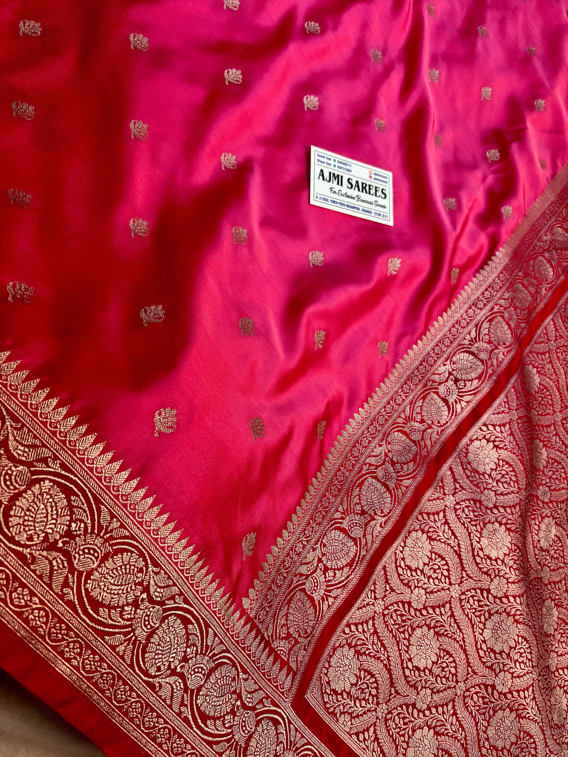 Rich cherry red Banarasi zari border on strawberry pink silk saree
