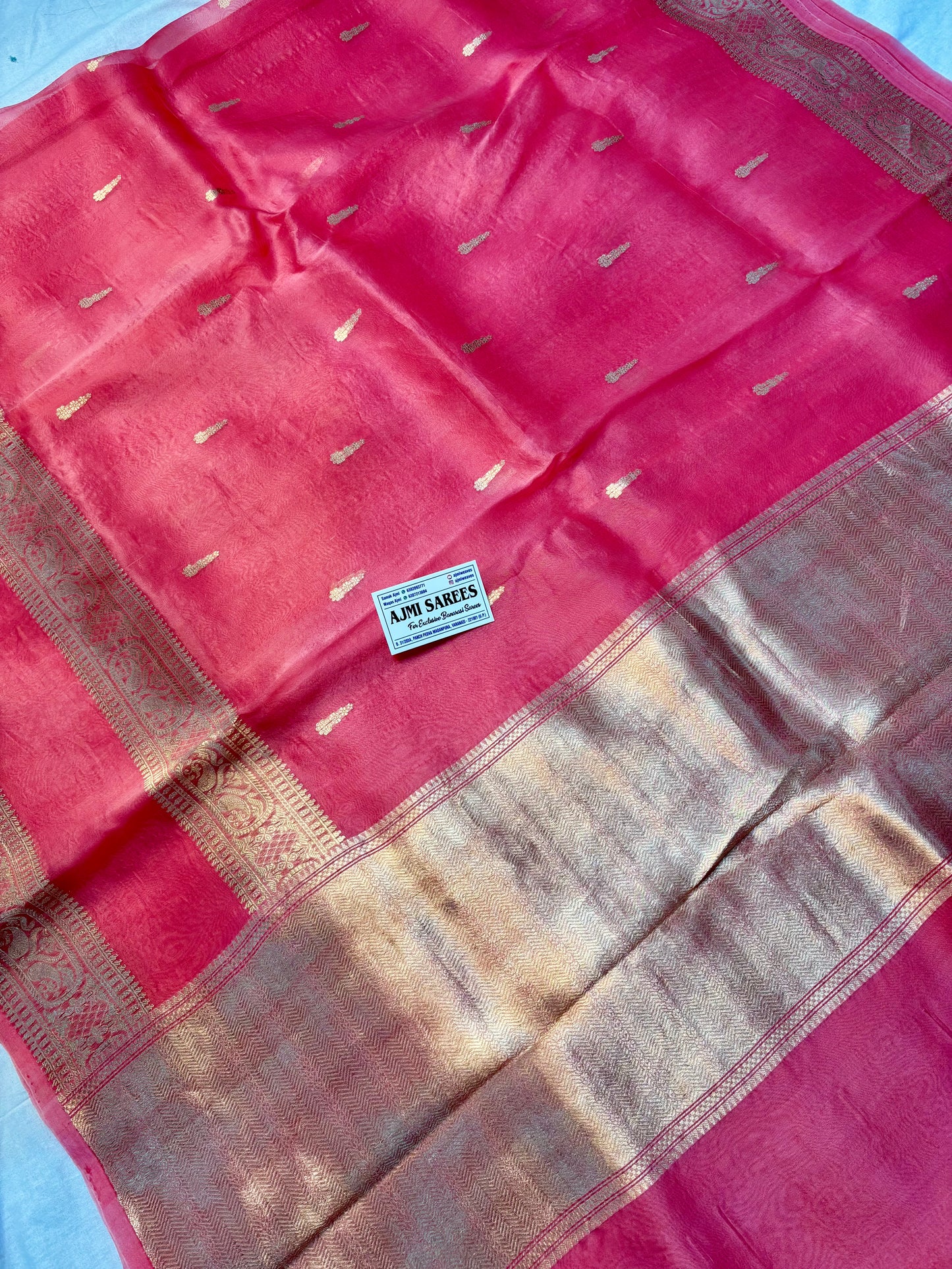 Traditional Kadwa woven Banarasi saree in Gajri pinkish-red with detailed zari borders