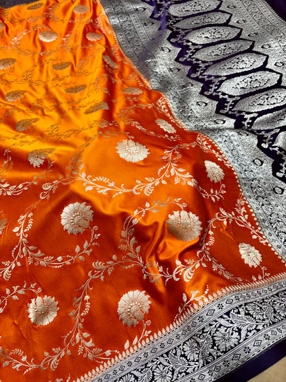 Mashru Katan Silk Orange Banarasi Saree with Contrast Violet Border and Rich Zari Floral Weaving