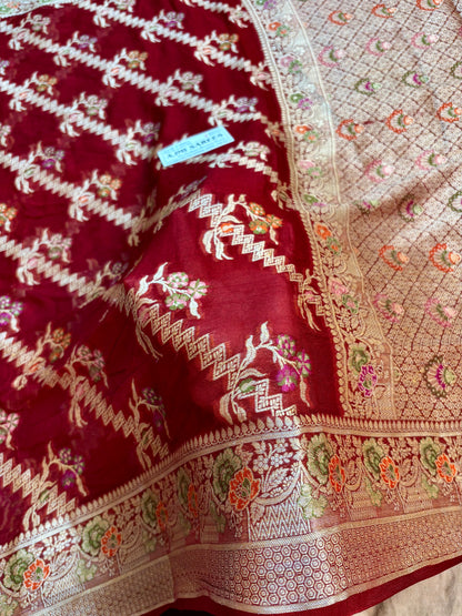 Maroon Tilfi Banarasi saree featuring intricate water zari work