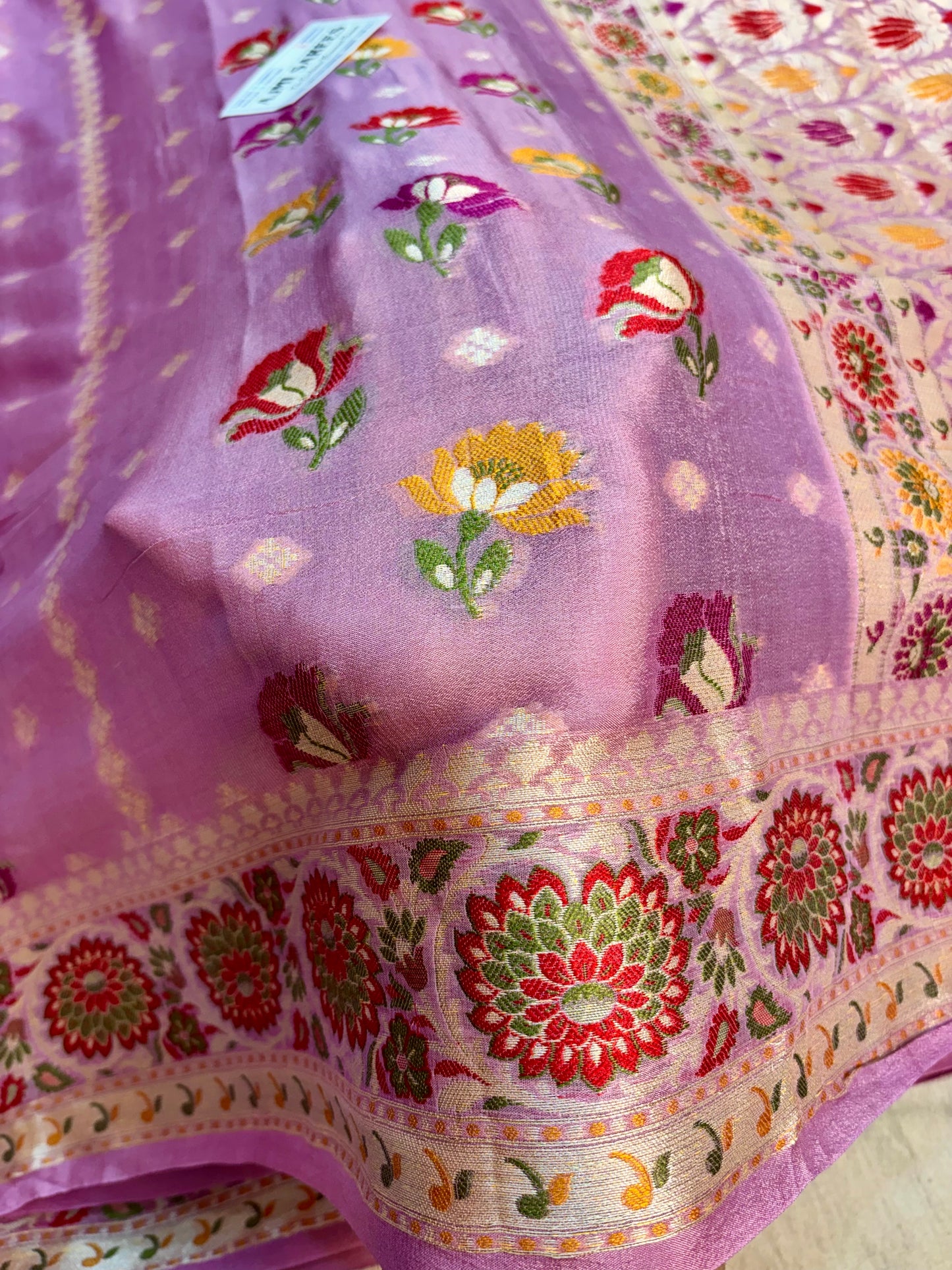 Rani pink Tilfi Banarasi saree with floral motifs