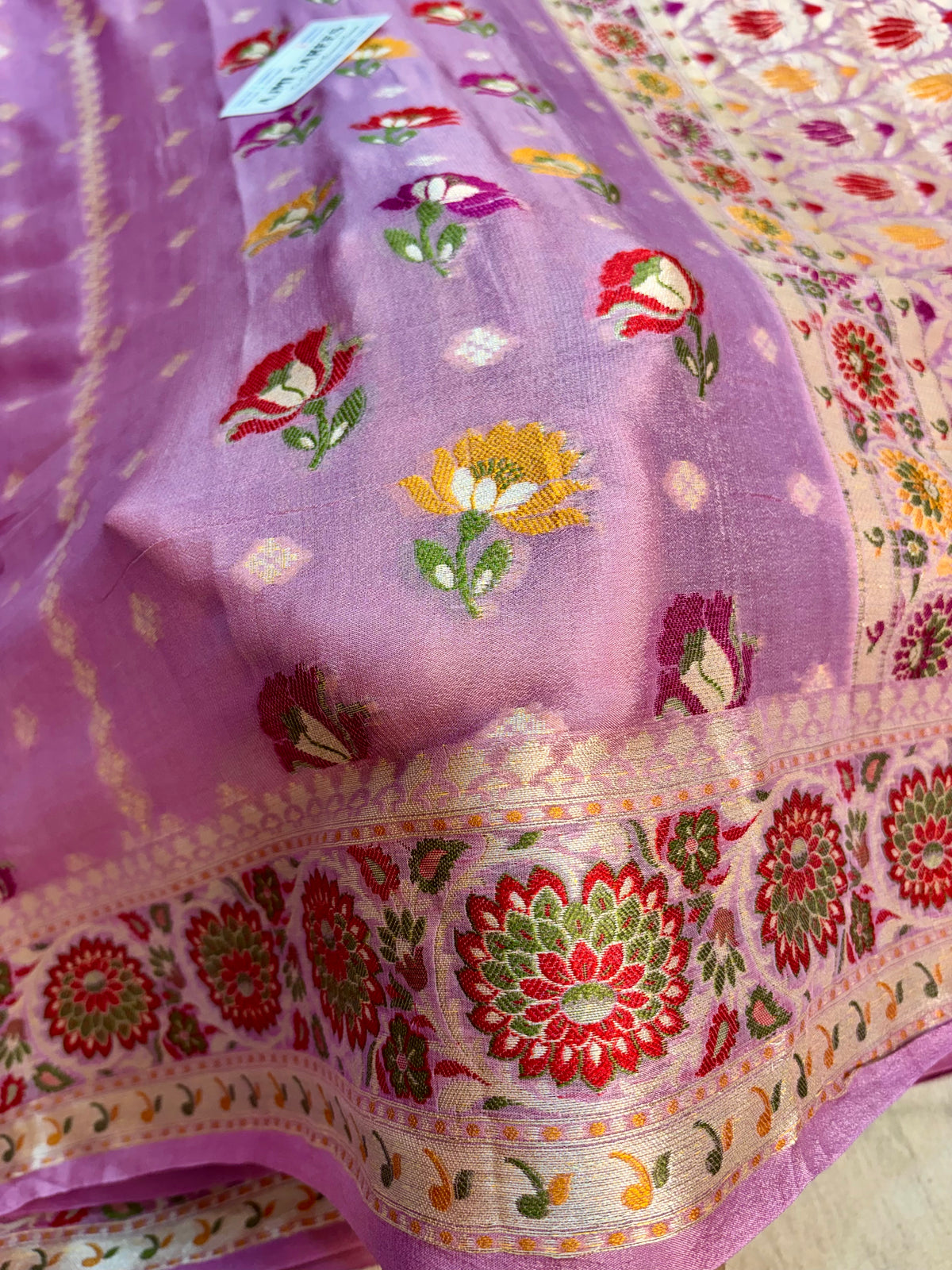 Rani pink Tilfi Banarasi saree with floral motifs