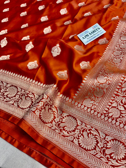 Luxury wedding saree in rust Mashru Katan silk with golden zari motifs