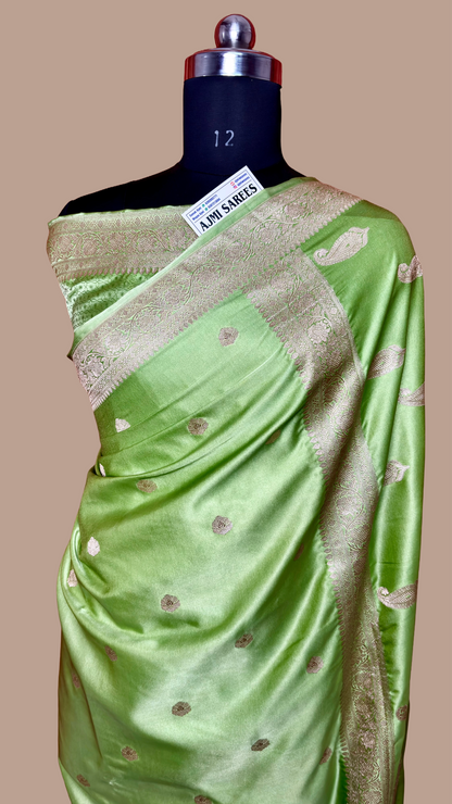 Elegant pista green banarasi saree with traditional woven border