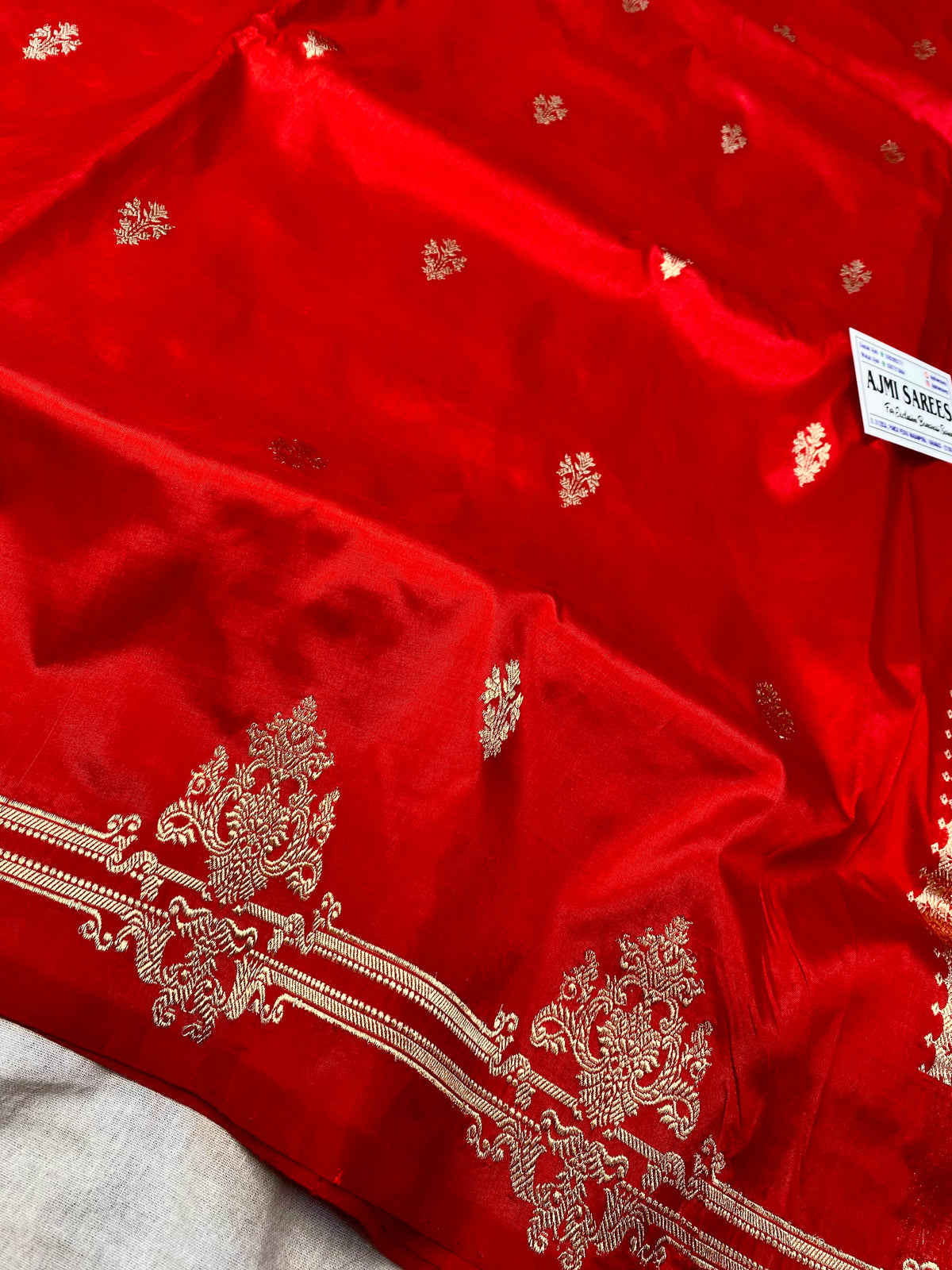 Red pure Katan silk handloom Banarasi saree with all-over Kadwa motifs