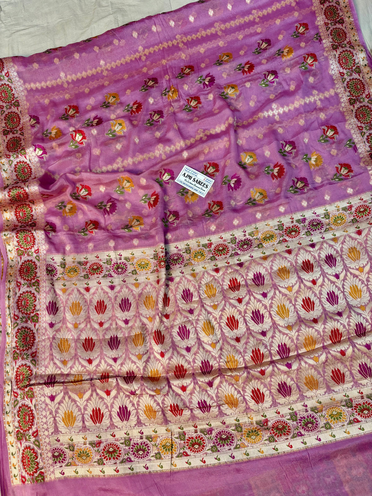 Rani pink Banarasi saree with water zari border