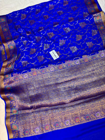 Royal blue Banarasi saree with antique copper zari and floral motifs