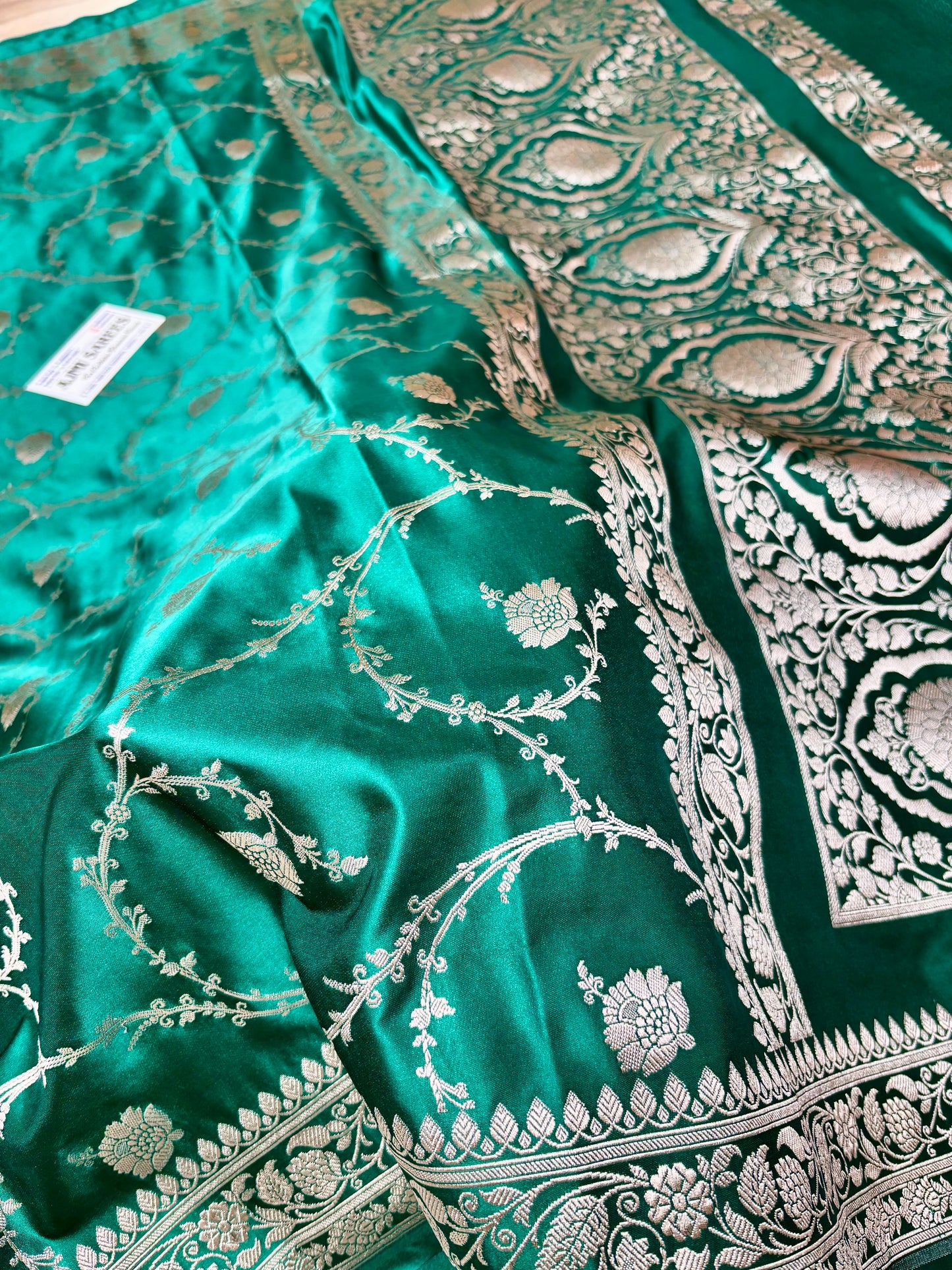 Rama green Banarasi saree with silver zari border