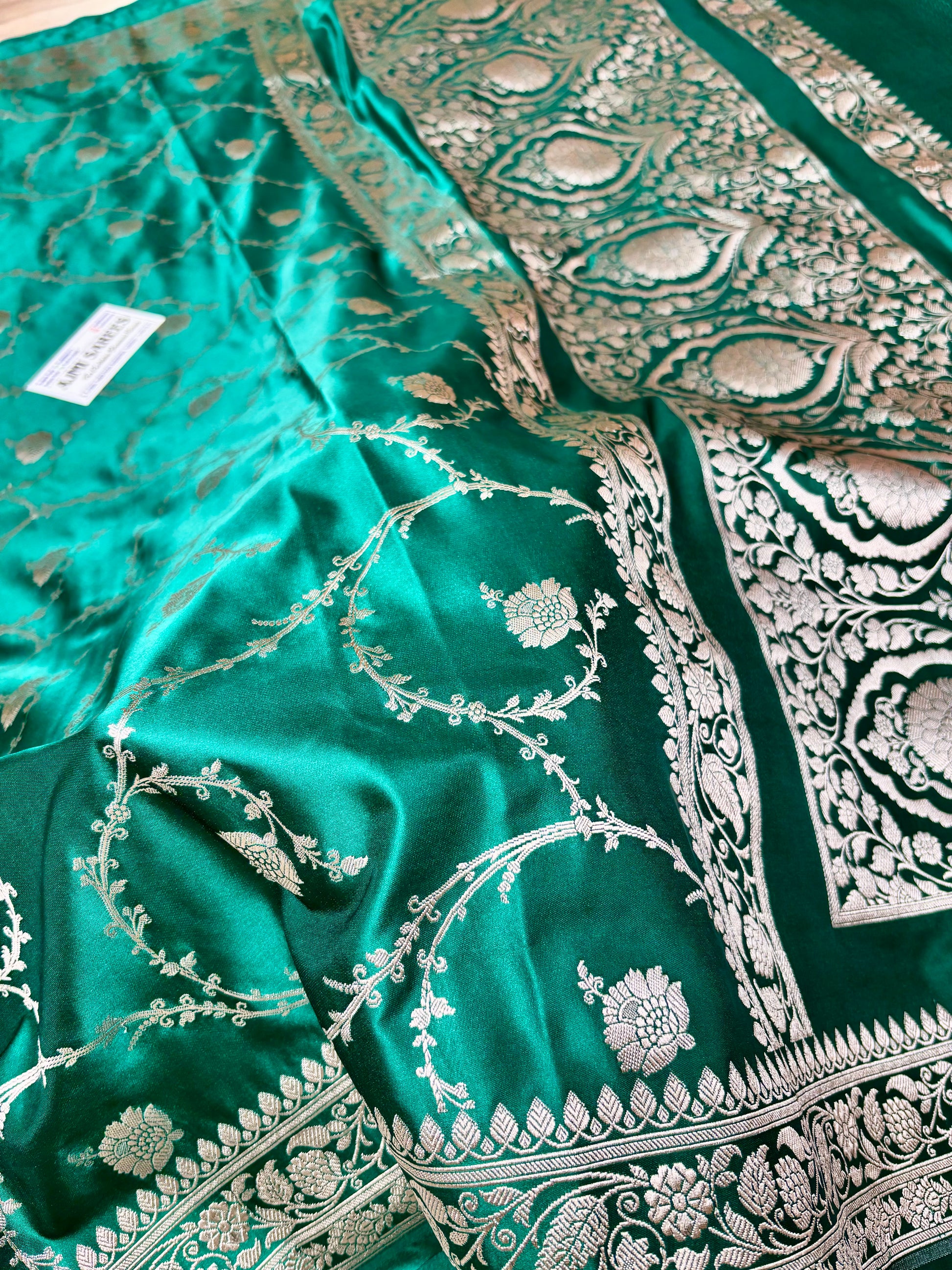Rama green Banarasi saree with silver zari border