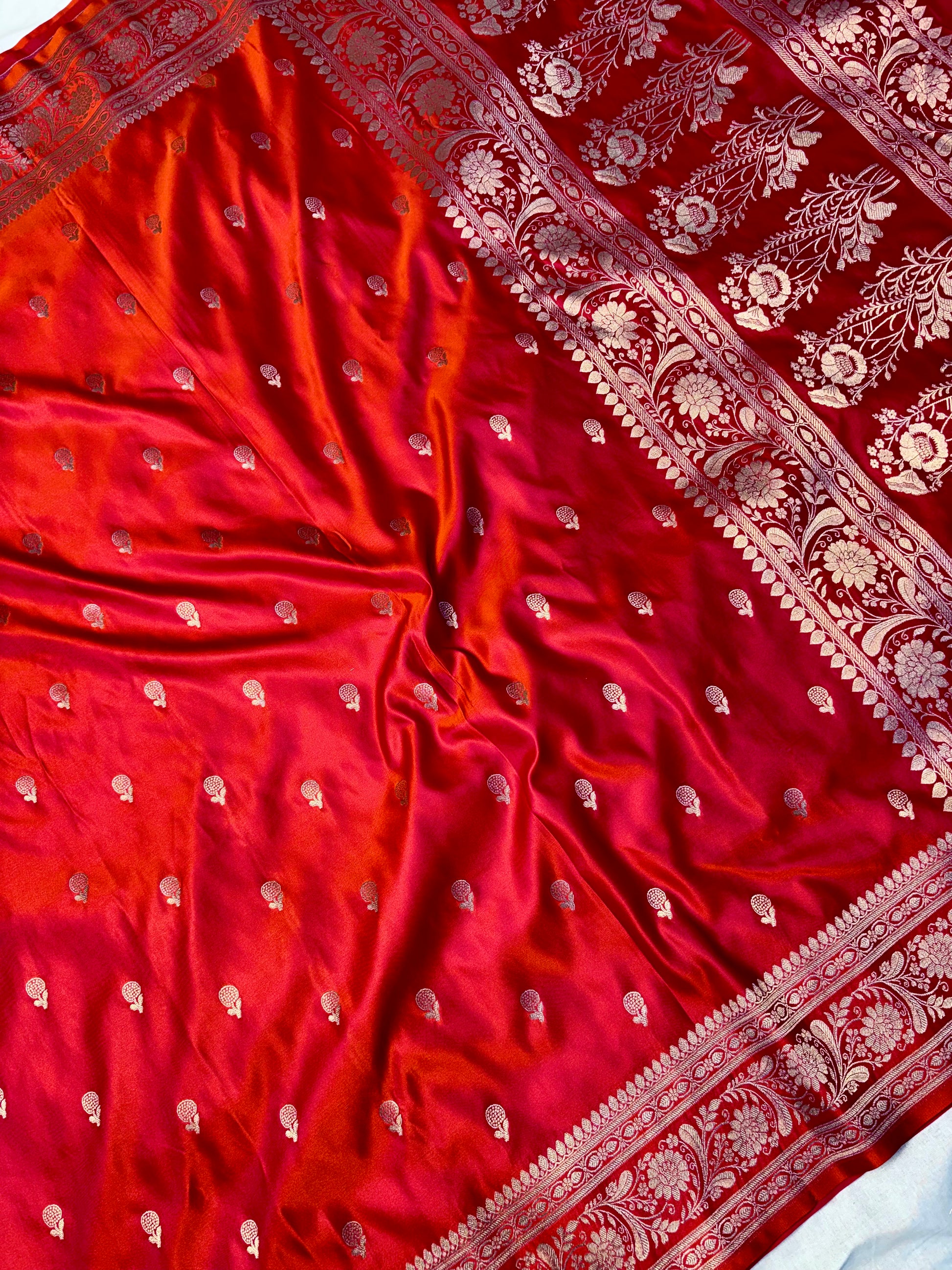 Luxury red and rani Banarasi saree with floral zari pallu