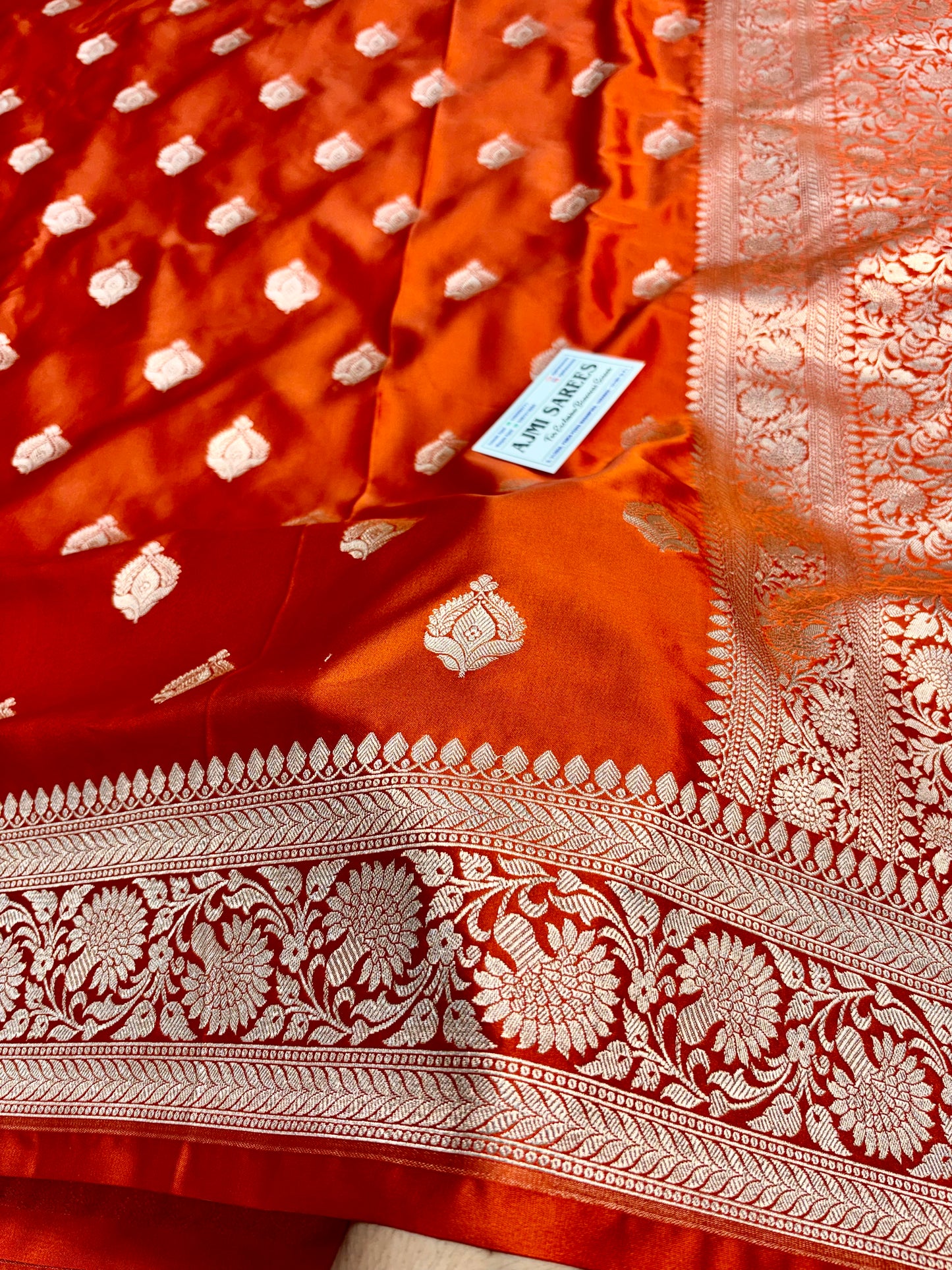 Premium Mashru Katan silk Banarasi saree in rust with golden zari weaving