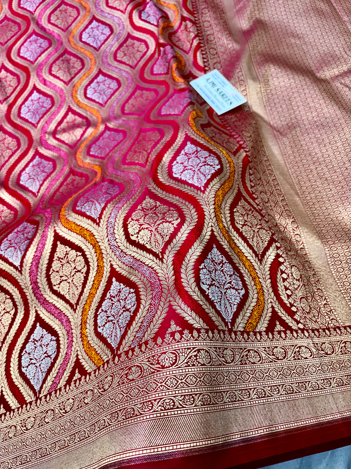 Luxury hot pink Katan silk Banarasi saree with intricate all-over zari jaal