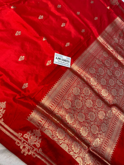 Red handloom Banarasi saree with Kadwa motifs and striped blouse piece
