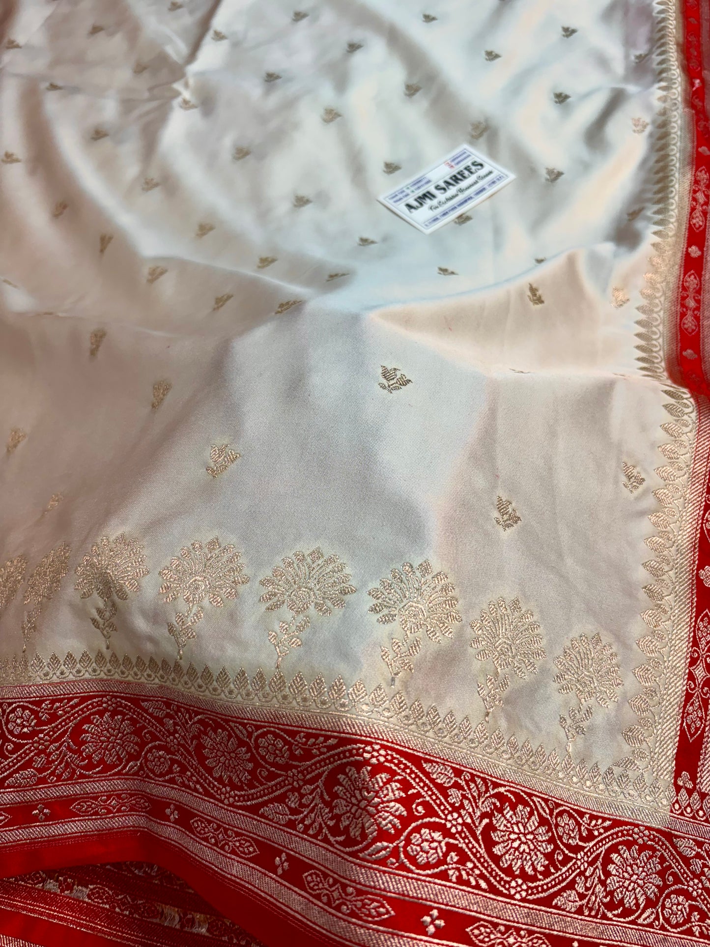 Traditional Banarasi saree with golden zari floral motifs