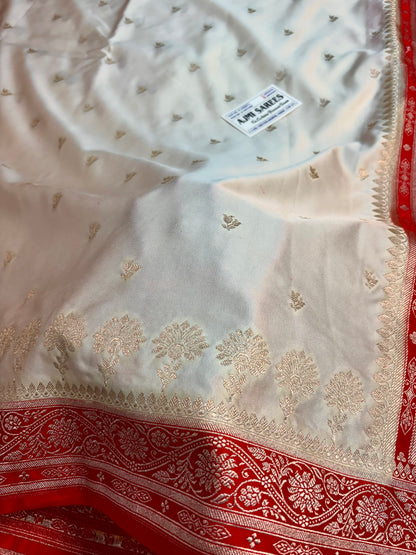 Traditional Banarasi saree with golden zari floral motifs