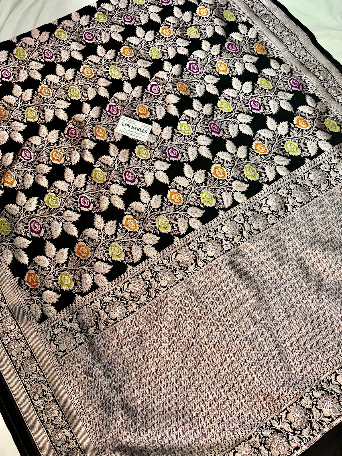Black Katan silk Banarasi saree with multicolour Meenakari roses and intricate silver zari weaving