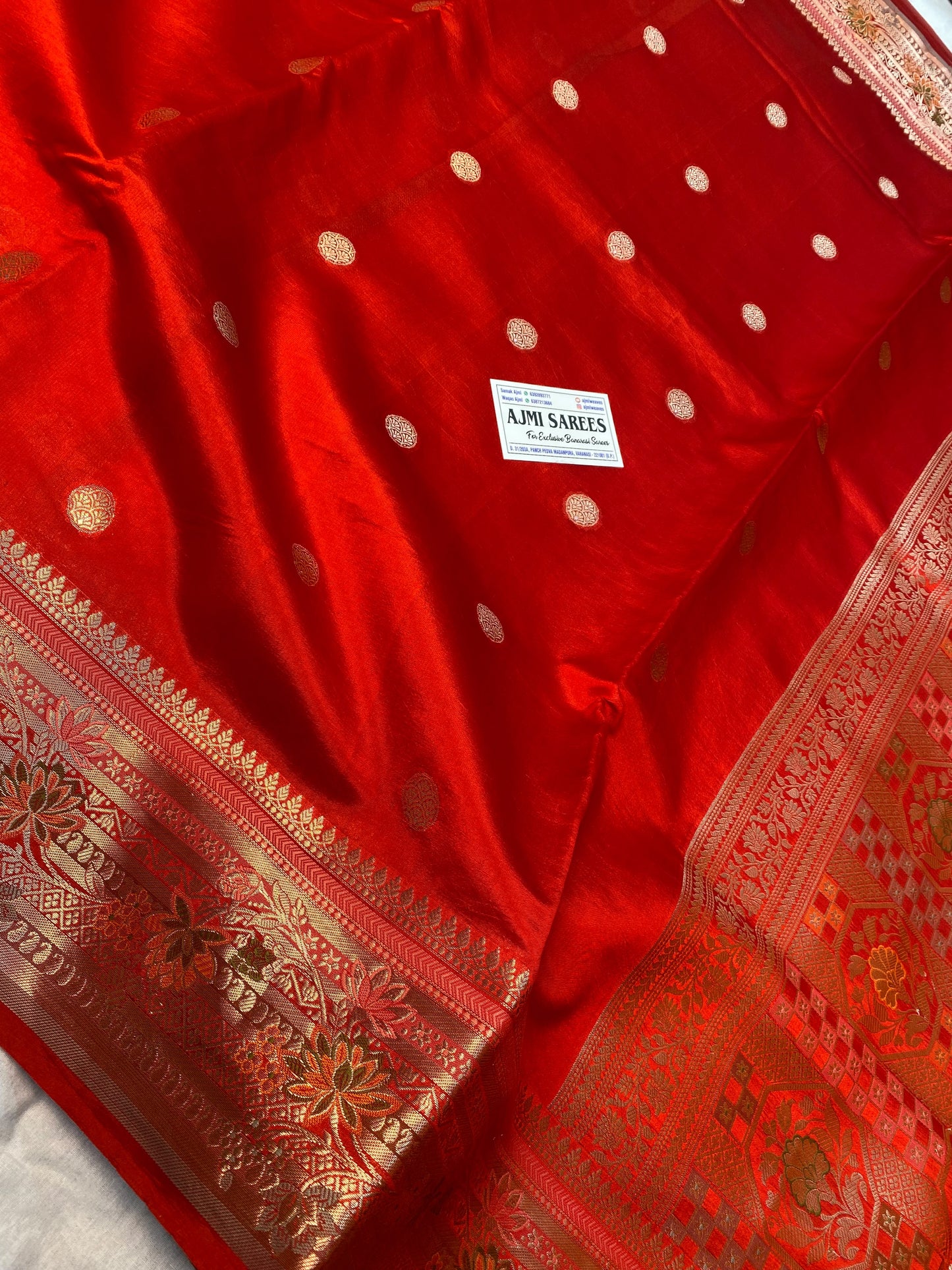 Traditional pure Mango Silk saree in orange with silver Meenakari rounded motifs