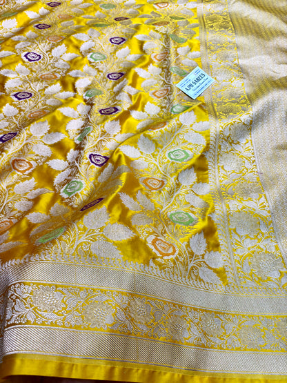 bright yellow saree with multicolor meenakari motifs