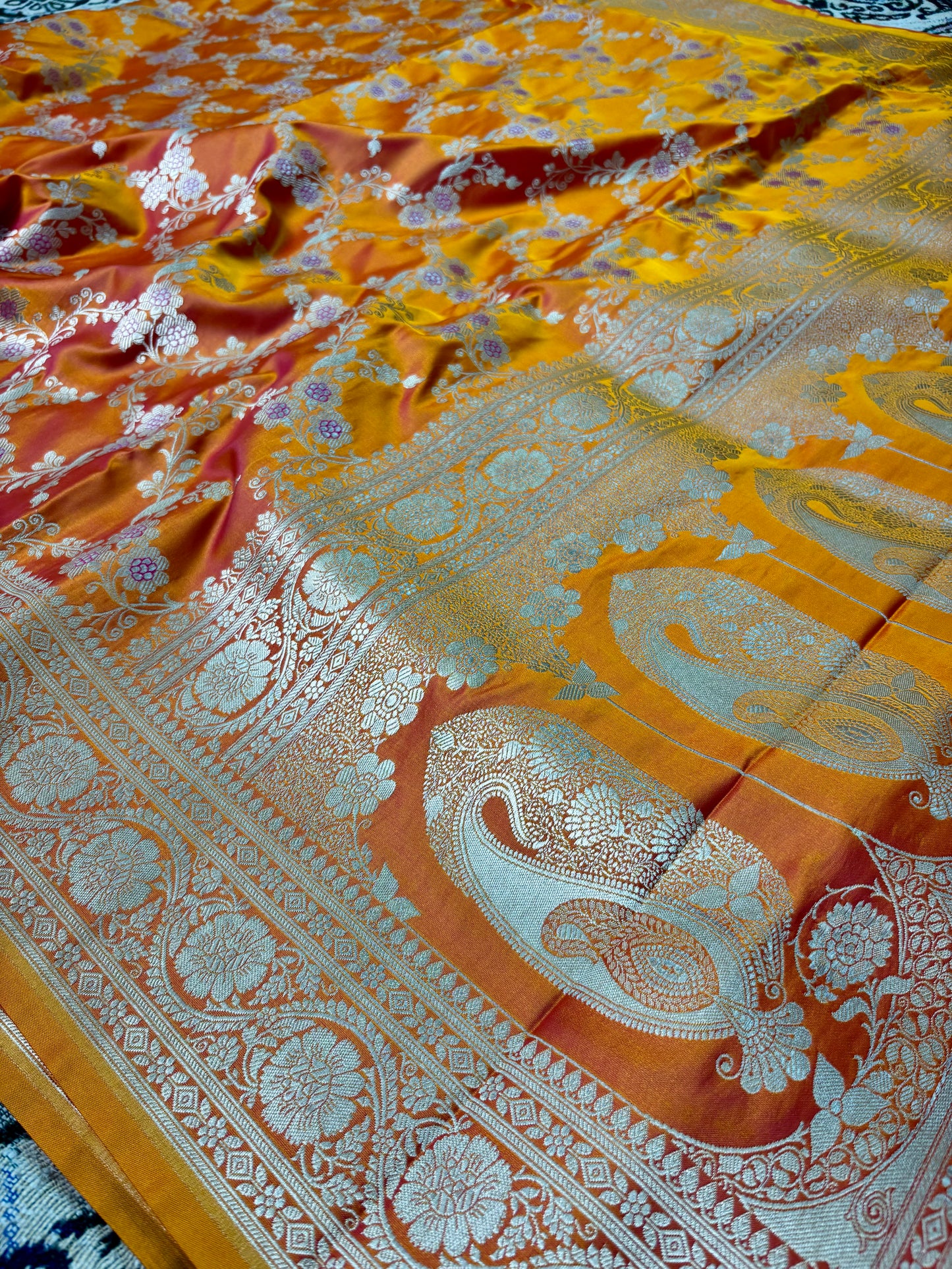 Festive wear Banarasi saree with intricate floral meenakari pattern