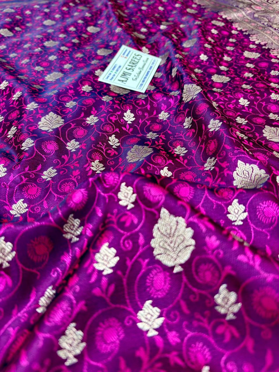 rani pink and navy blue banarasi silk saree with traditional zari motifs