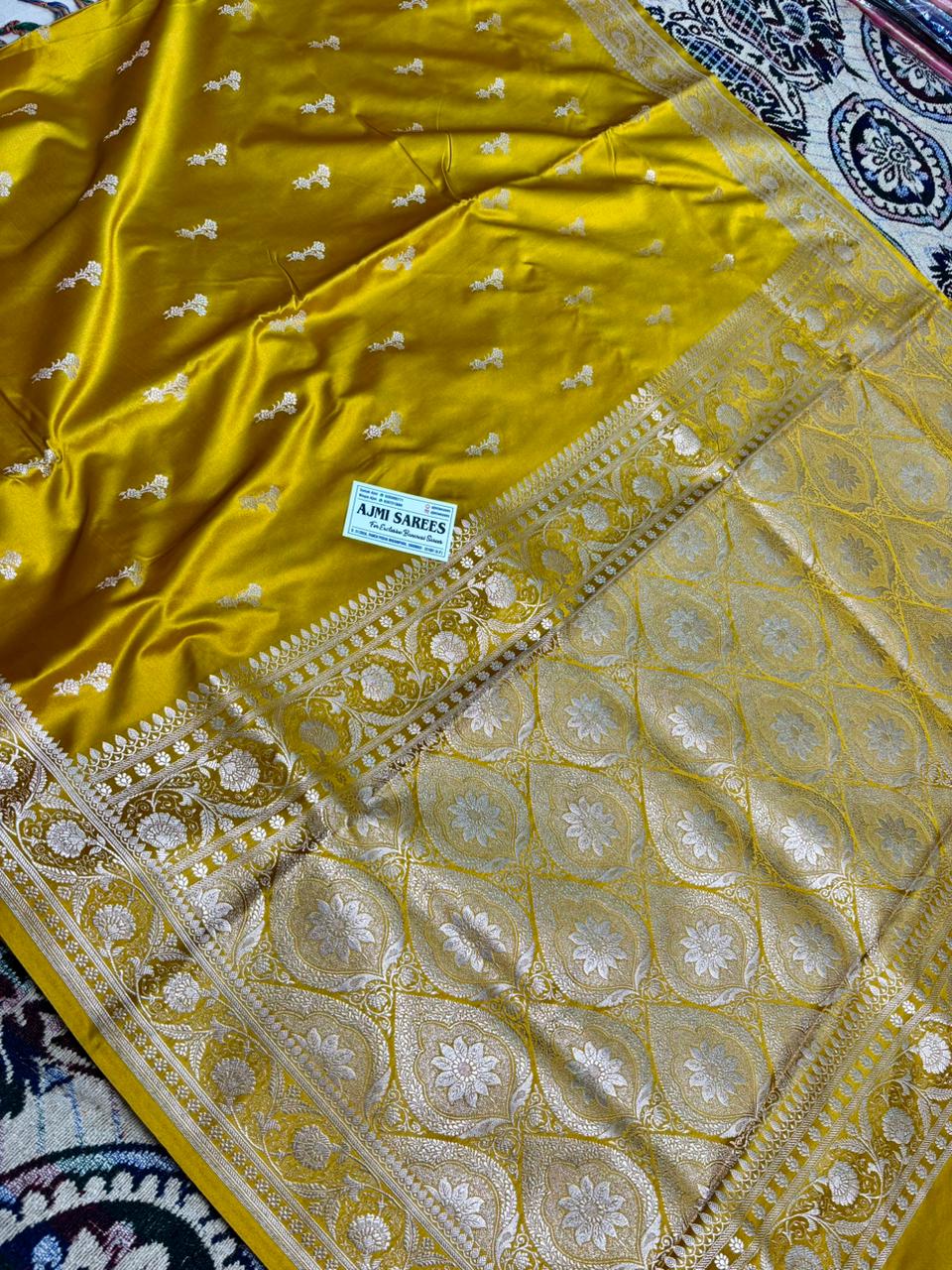 luxury mustard banarasi saree with intricate zari booti work