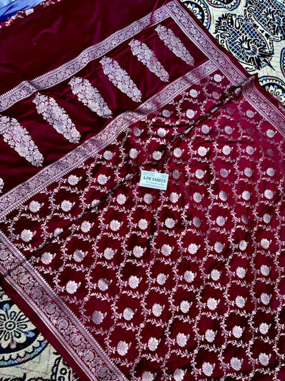 traditional maroon banarasi saree with zari border design