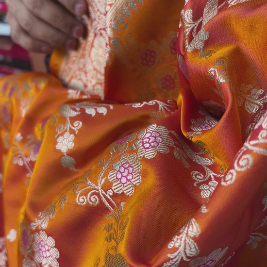 Wedding wear orange Banarasi saree with multicolor meenakari work