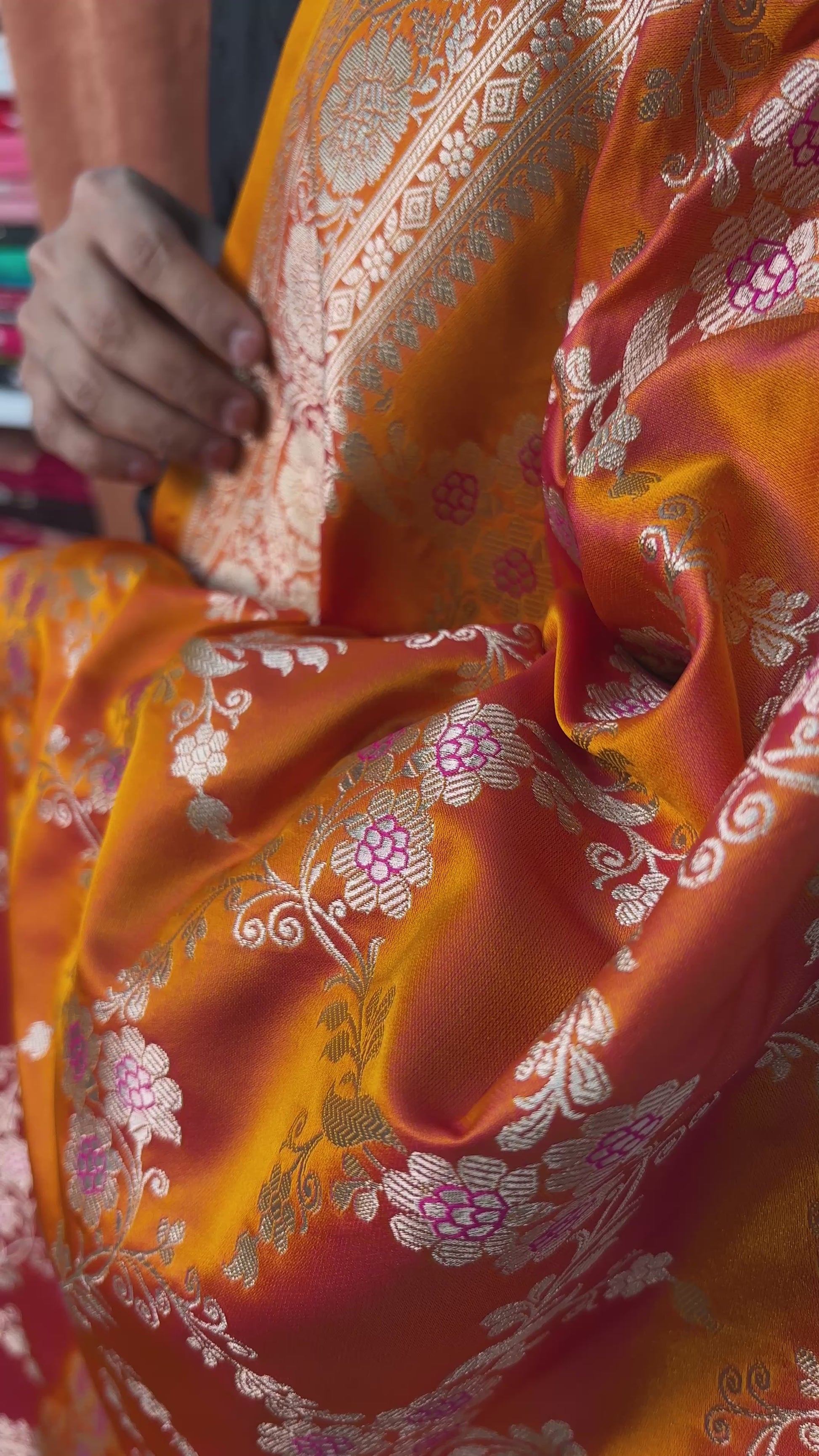 Wedding wear orange Banarasi saree with multicolor meenakari work