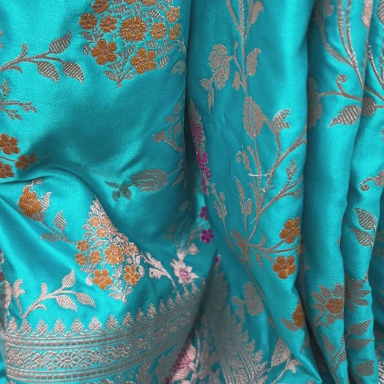 Traditional Floral Jaal Banarasi Saree in Firozi Color